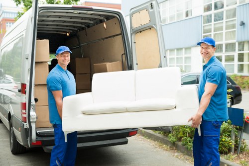 Professional packing team preparing household boxes in Richmond