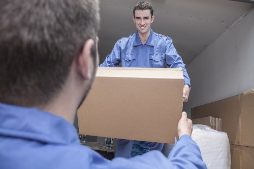 Professional movers loading household items in Richmond