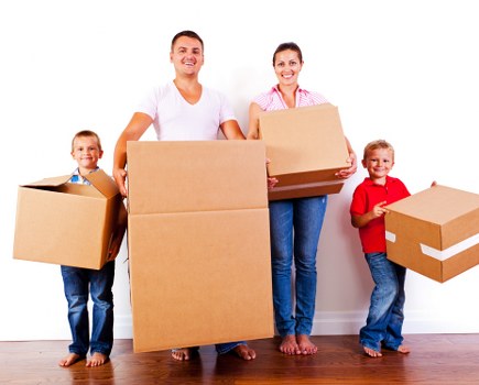 Moving boxes and furniture prepared for a Richmond removal service