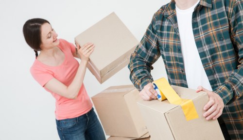 Loading boxes and furniture into a hired removal truck