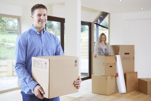 House removalists preparing a Richmond home move with boxes and furniture