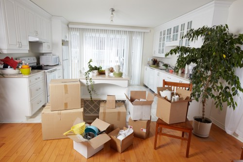 Removal team handling boxes during a home move