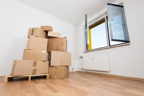 Packed office boxes and labeled work items for a Richmond relocation