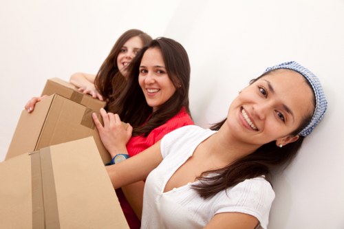 Careful wrapping of fragile items during a Richmond house move