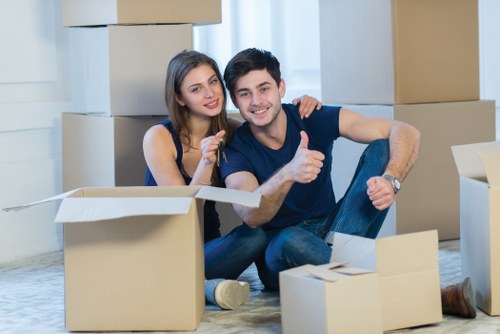 Movers handling desks and office furniture during a Richmond move