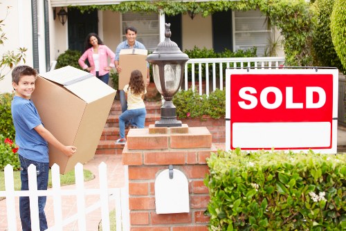 Local team collecting a wardrobe from a Richmond property