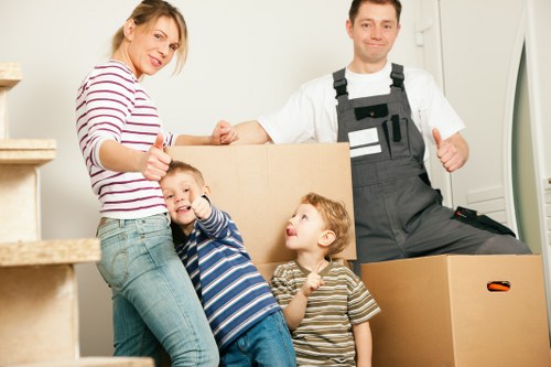 Staff using protective equipment during a house removal